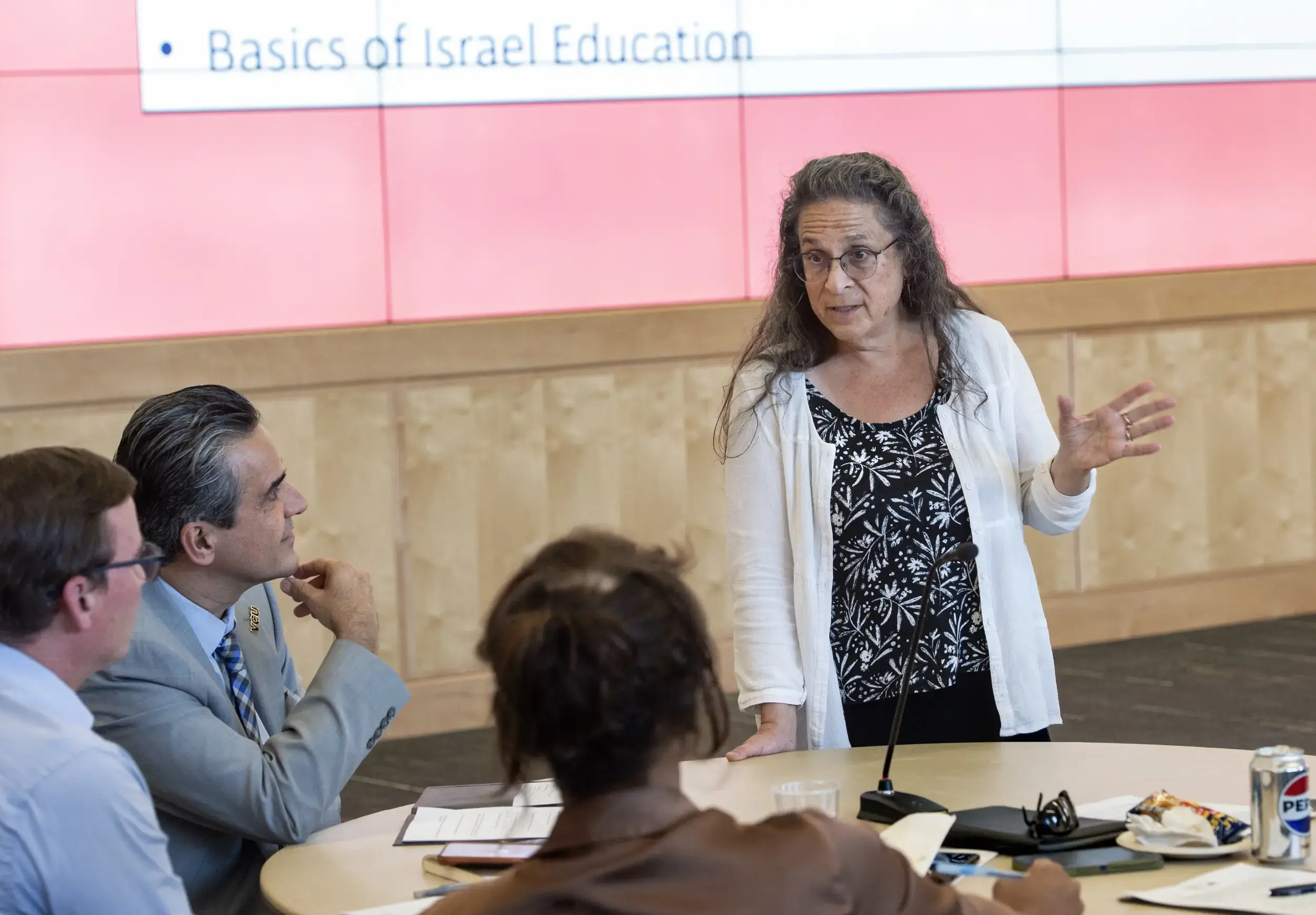 Nancy Koppelman, a faculty member at Evergreen State College, speaks with attendees during one of the “Inclusive Voices: Exploring Israeli and Palestinian Culture and Identity” events. (Kevin Morley, Enterprise Marketing and Communications)