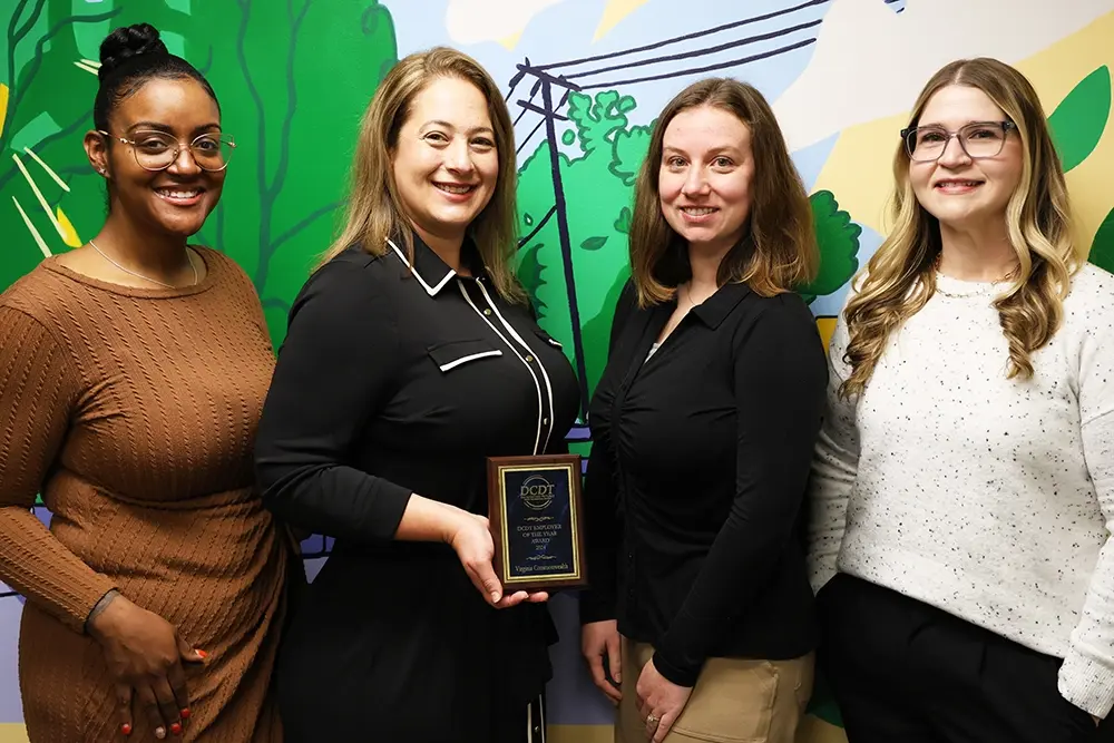 VCU Human Resources staff were presented with the 2024 Division on Career Development and Transition Employer of the Year Award by Sonya Durham, a career support specialist with ACE-IT in College. (Photo by Casey Bennett)